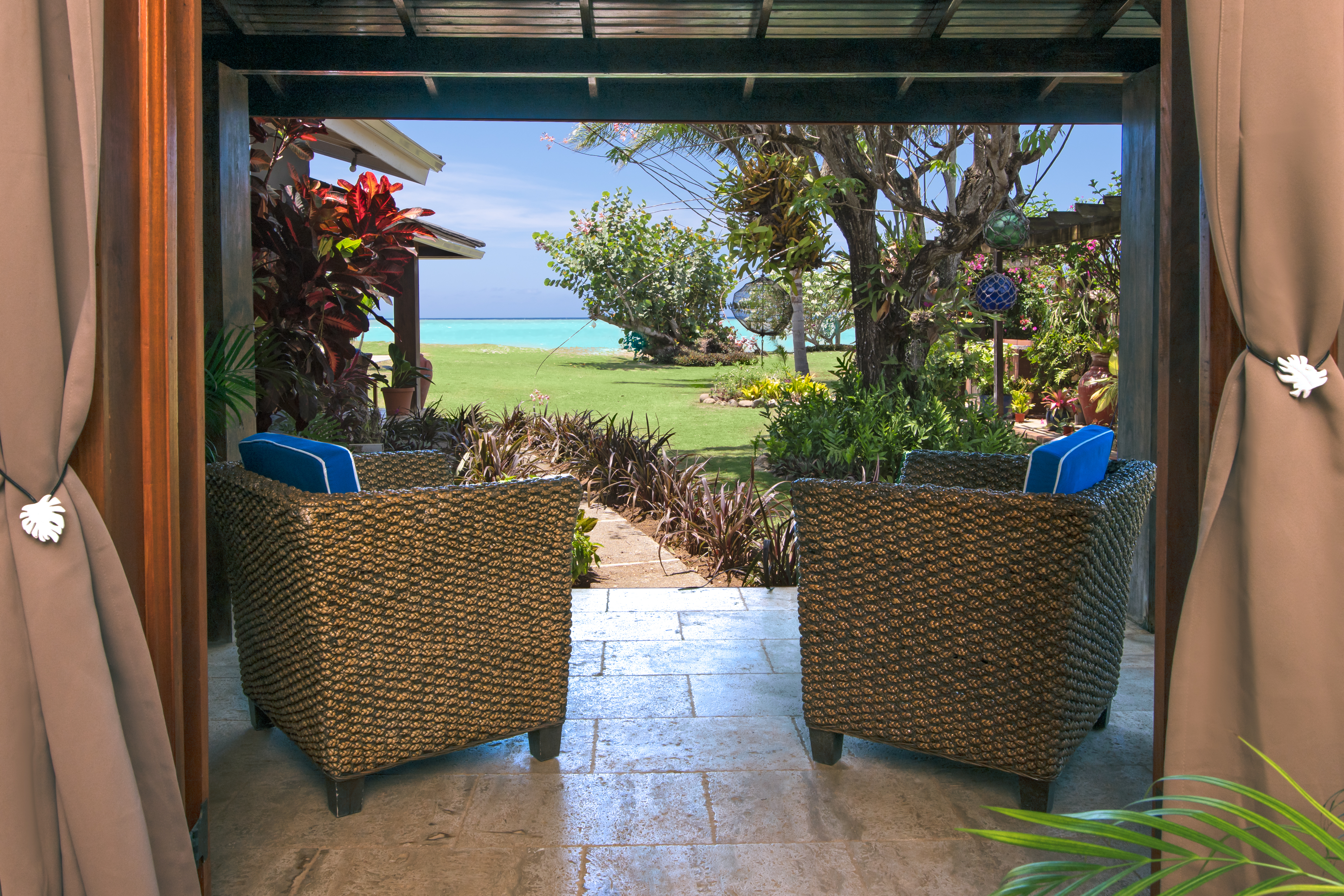 Sand Pebbles Villa coastal lounge view.